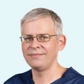 Dr. Lajos Harza Implantologue, Dentiste Spécialiste Allemand, Anglais